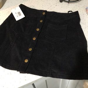 Pink Lily Corduroy Black Mini Skirt w/ buttons.